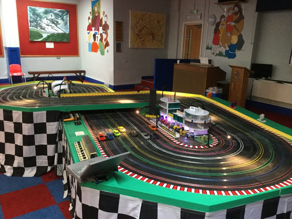 Why should I choose Giant Scalextric Hire for my next event? 6 8 Lane Scalextric Hire