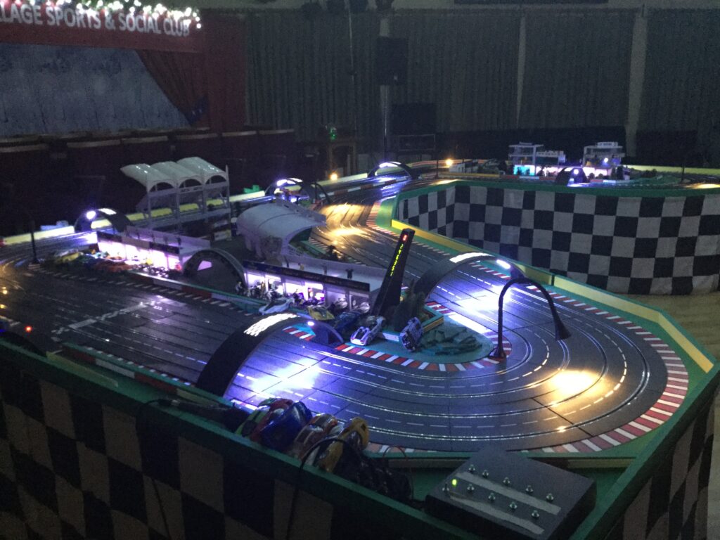 Why should I choose Giant Scalextric Hire for my next event? 5 Scalextric 6