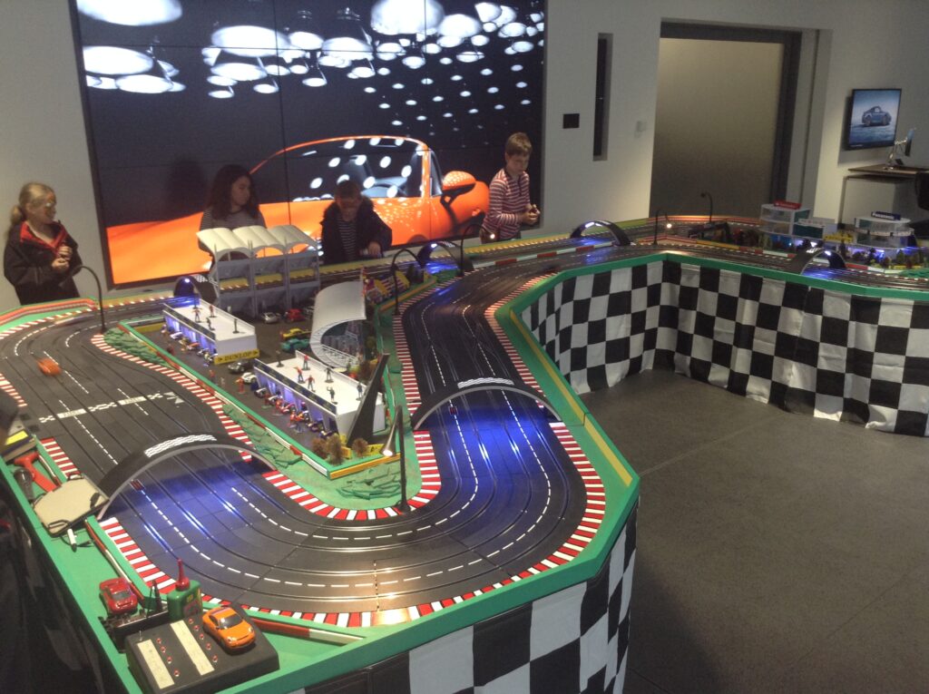Why should I choose Giant Scalextric Hire for my next event? 4 Large Digital Scalextric Hire