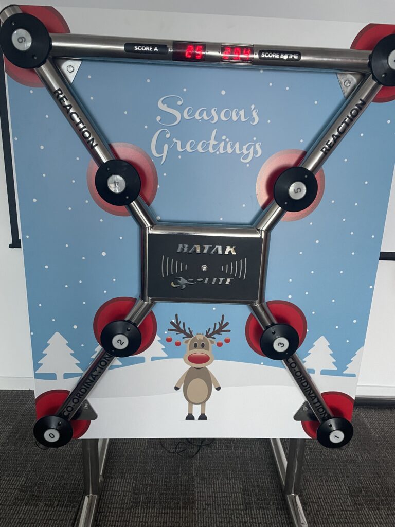 Engage your team with Batak at your Christmas event. 4 Christmas Batak Lite Hire